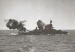 Gustav V firing her guns