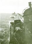 Destroyer MJLNER escorting a Gotland ferry
