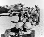Curtiss P-40's Loading Bombs