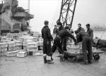 HMS Illustrious Unloading Pom-Pom Ammunition