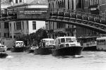 Barge with Security Vessels