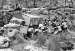 Using Logs to Free Bogged Truck